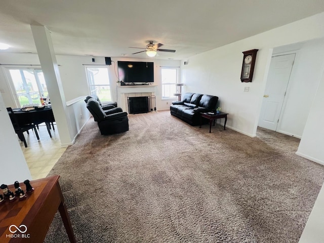 19519 Prairie Crossing Dr, Noblesville, IN 46062 - living room with a ceiling fan, a tile fireplace, and carpet