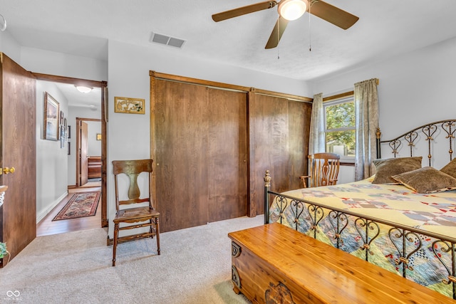 2571 Stonybrook Ln, Franklin, IN 46131 - bedroom featuring multiple closets, carpet flooring, and ceiling fan