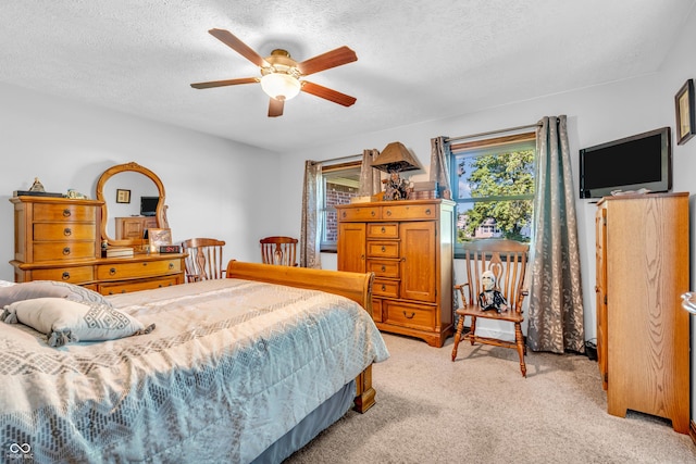 2571 Stonybrook Ln, Franklin, IN 46131 - bedroom featuring light carpet, a textured ceiling, and ceiling fan