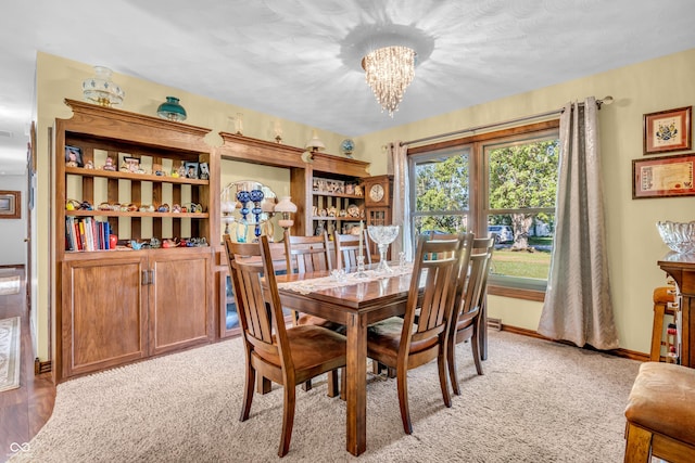 2571 Stonybrook Ln, Franklin, IN 46131 - dining area with a chandelier and light carpet