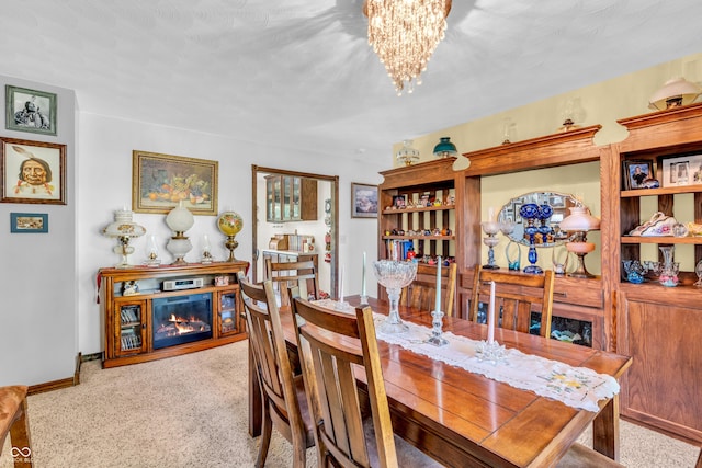 2571 Stonybrook Ln, Franklin, IN 46131 - dining area featuring a chandelier and carpet flooring