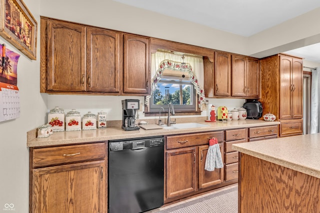 2571 Stonybrook Ln, Franklin, IN 46131 - kitchen featuring dishwashing machine, light countertops, and brown cabinets