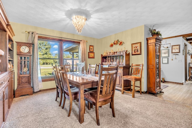 2571 Stonybrook Ln, Franklin, IN 46131 - dining area with a chandelier, light colored carpet, and a textured ceiling