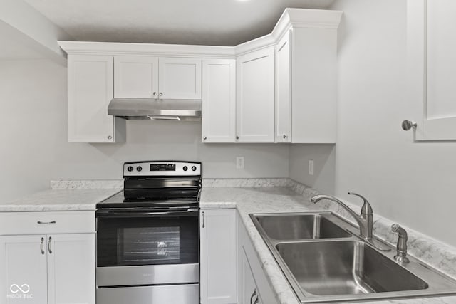 135 S Dr, Anderson, IN 46013 - kitchen featuring electric stove, under cabinet range hood, and white cabinets