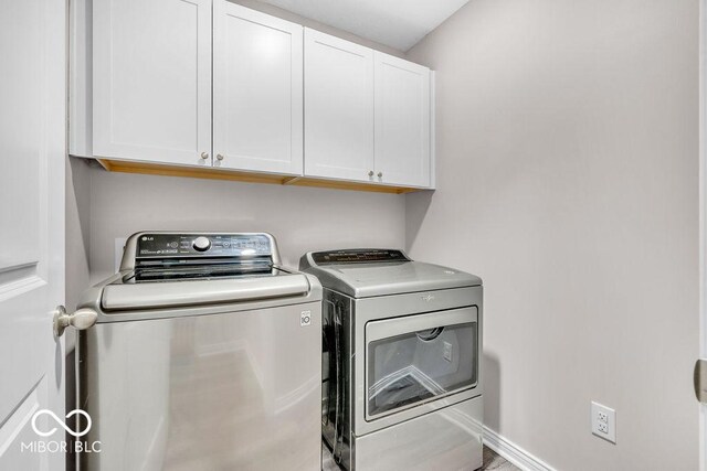 354 Mill Spgs, Fillmore, IN 46128 - laundry area with cabinet space and washer and clothes dryer