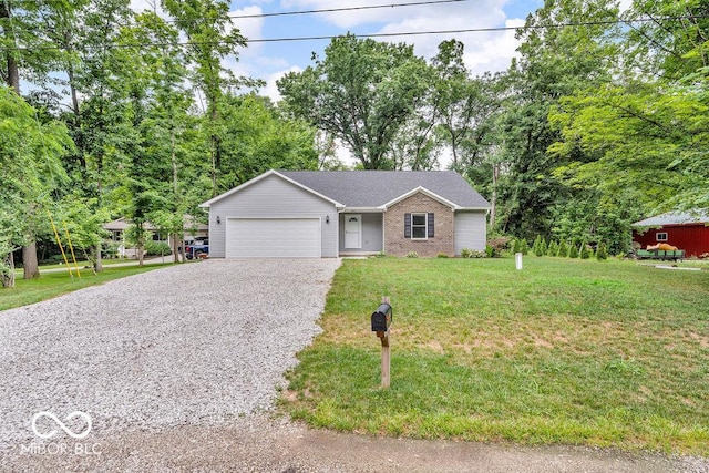 354 Mill Spgs, Fillmore, IN 46128 - single story home featuring driveway, a garage, a front yard, and brick siding