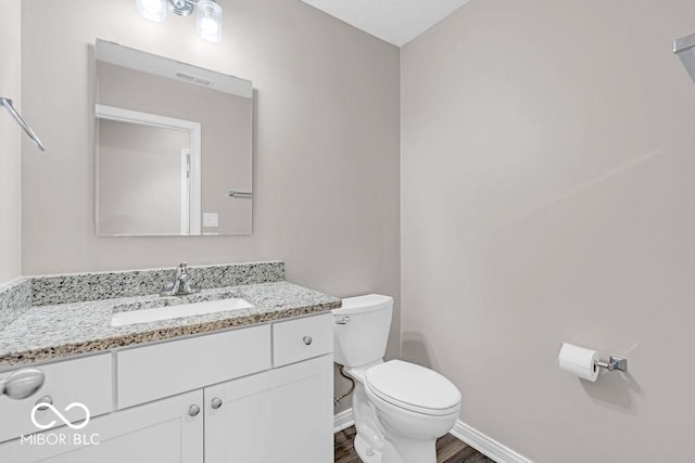 354 Mill Spgs, Fillmore, IN 46128 - half bathroom featuring vanity and wood finished floors