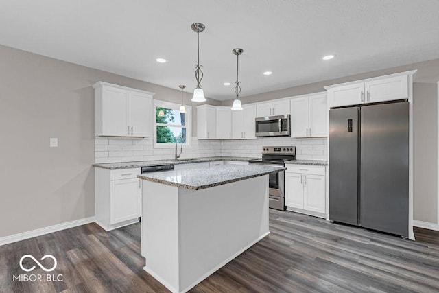354 Mill Spgs, Fillmore, IN 46128 - kitchen featuring appliances with stainless steel finishes, dark wood finished floors, white cabinetry, tasteful backsplash, and recessed lighting