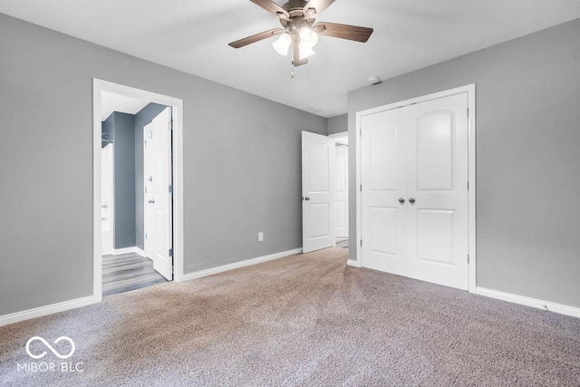 354 Mill Spgs, Fillmore, IN 46128 - unfurnished bedroom featuring carpet floors, a closet, a ceiling fan, and connected bathroom