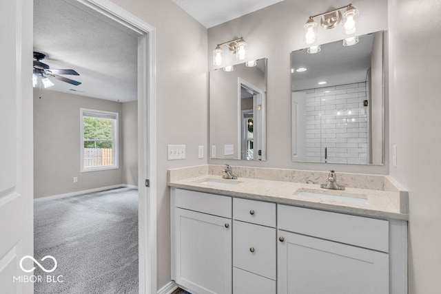 354 Mill Spgs, Fillmore, IN 46128 - full bathroom with double vanity, a ceiling fan, and tiled shower