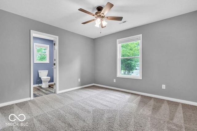 354 Mill Spgs, Fillmore, IN 46128 - unfurnished bedroom featuring carpet floors, ensuite bathroom, and ceiling fan