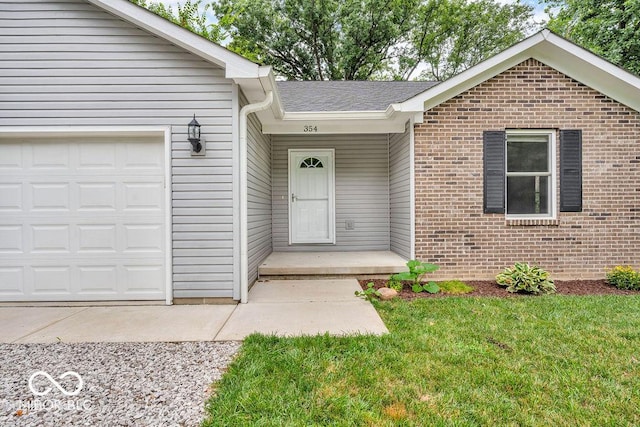354 Mill Spgs, Fillmore, IN 46128 - entrance to property with brick siding, a lawn, and an attached garage