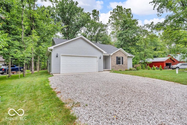 354 Mill Spgs, Fillmore, IN 46128 - view of front of home featuring gravel driveway, a garage, a front lawn, and brick siding
