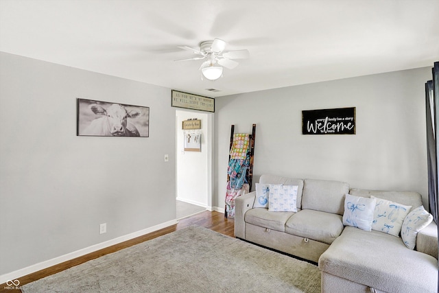 2630 Flintwood Dr, Columbus, IN 47203 - living area with a ceiling fan and wood finished floors
