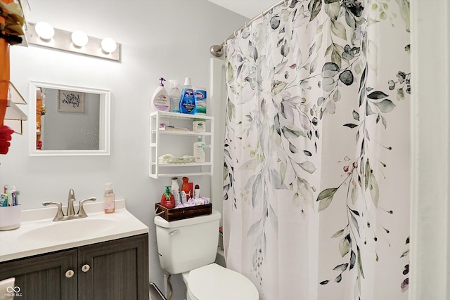 2630 Flintwood Dr, Columbus, IN 47203 - bathroom featuring vanity and curtained shower