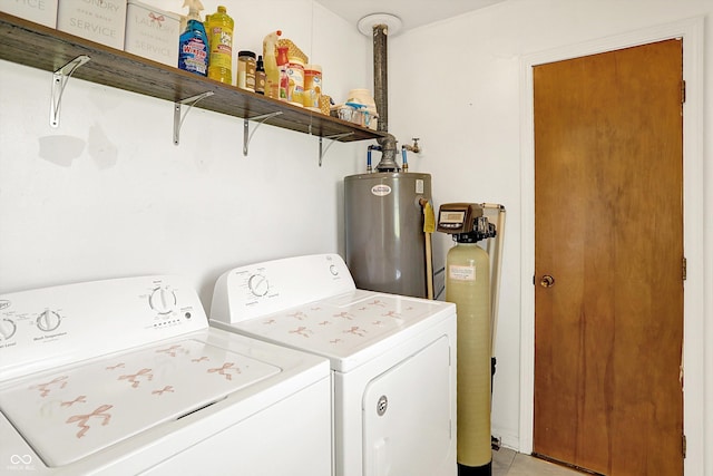 2630 Flintwood Dr, Columbus, IN 47203 - laundry room featuring water heater, washing machine and dryer, and light tile patterned flooring