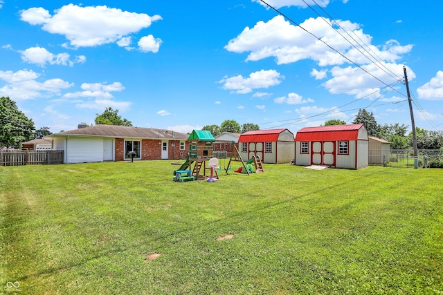 2630 Flintwood Dr, Columbus, IN 47203 - fenced backyard with a storage shed and a playground