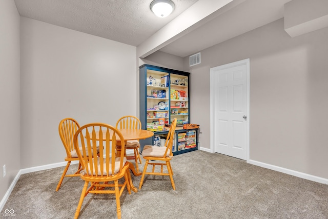 1397 Greenbriar Way, Franklin, IN 46131 - dining area featuring carpet floors and a textured ceiling