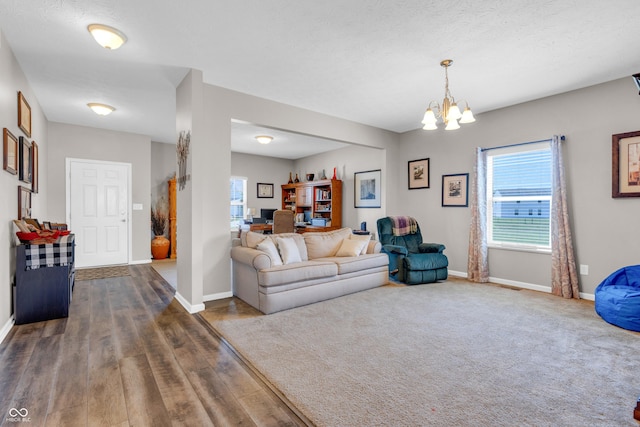 1397 Greenbriar Way, Franklin, IN 46131 - living room featuring a chandelier and dark wood-type flooring
