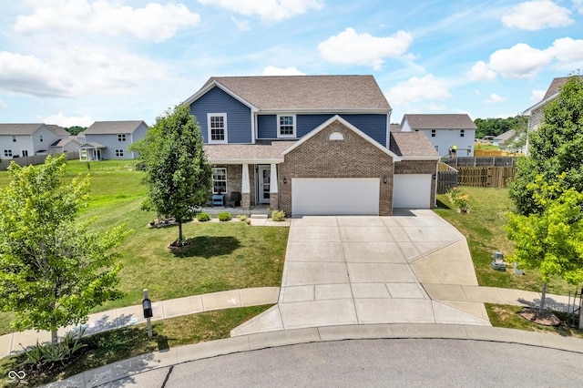 1397 Greenbriar Way, Franklin, IN 46131 - view of front of house featuring a garage, driveway, roof with shingles, and brick siding