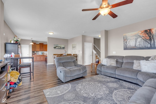 1397 Greenbriar Way, Franklin, IN 46131 - living room featuring wood finished floors, stairs, and a ceiling fan