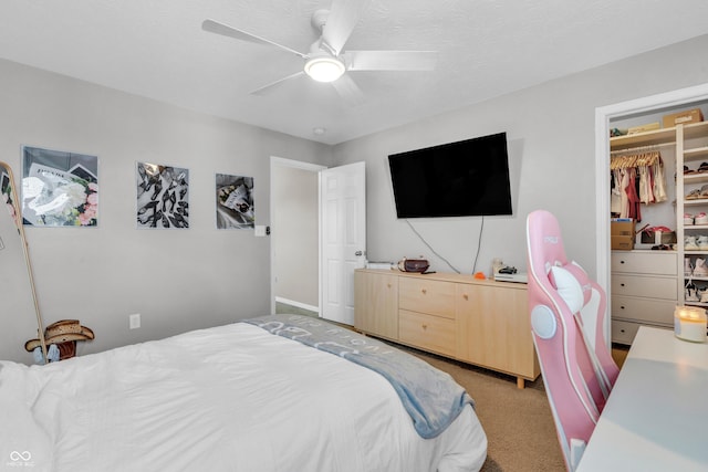 1397 Greenbriar Way, Franklin, IN 46131 - bedroom featuring light carpet, a ceiling fan, and a spacious closet