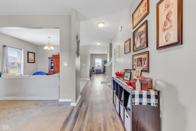 1397 Greenbriar Way, Franklin, IN 46131 - corridor with a chandelier and wood finished floors