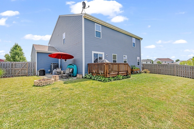 1397 Greenbriar Way, Franklin, IN 46131 - rear view of property featuring a fire pit, a deck, and a fenced backyard