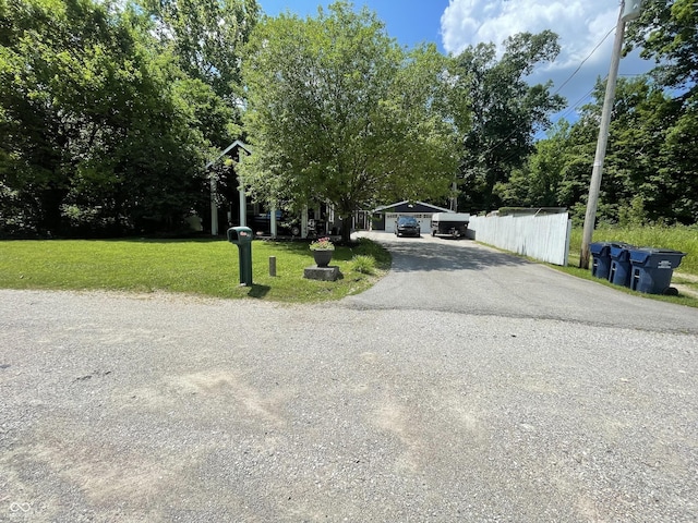 1446 W State Highway 46, Spencer, IN 47460 - view of asphalt driveway with view of wooded area