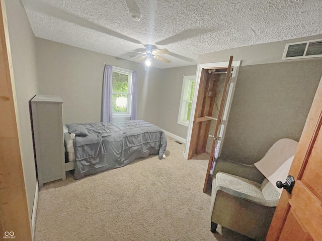 1446 W State Highway 46, Spencer, IN 47460 - bedroom with carpet floors, a textured ceiling, and a ceiling fan