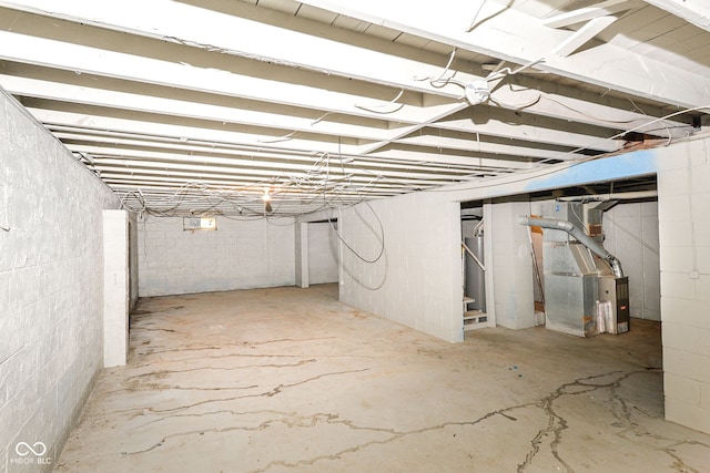 4218 N Irvington Ave, Indianapolis, IN 46226 - unfinished basement with heating unit and stairway