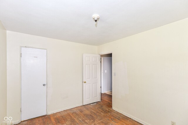 4218 N Irvington Ave, Indianapolis, IN 46226 - unfurnished room with hardwood / wood-style floors and baseboards