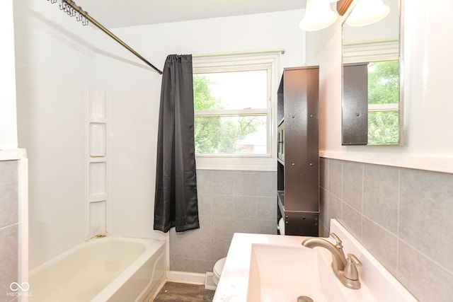 4218 N Irvington Ave, Indianapolis, IN 46226 - full bathroom with tile walls, bathing tub / shower combination, and vanity