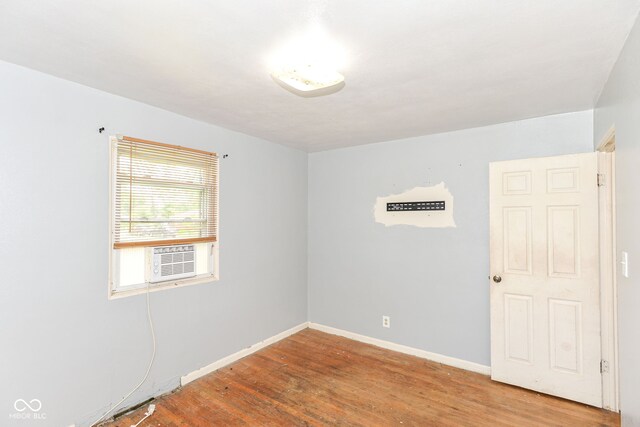 4218 N Irvington Ave, Indianapolis, IN 46226 - unfurnished room featuring wood finished floors and baseboards