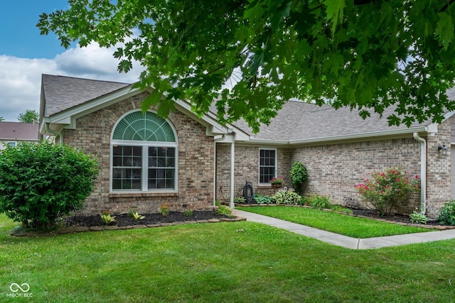 48 Lasalle Ct, Whiteland, IN 46184 - single story home featuring a front yard, roof with shingles, and brick siding