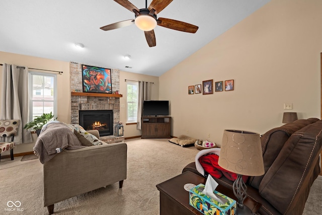 48 Lasalle Ct, Whiteland, IN 46184 - living area with carpet, a ceiling fan, vaulted ceiling, plenty of natural light, and a brick fireplace