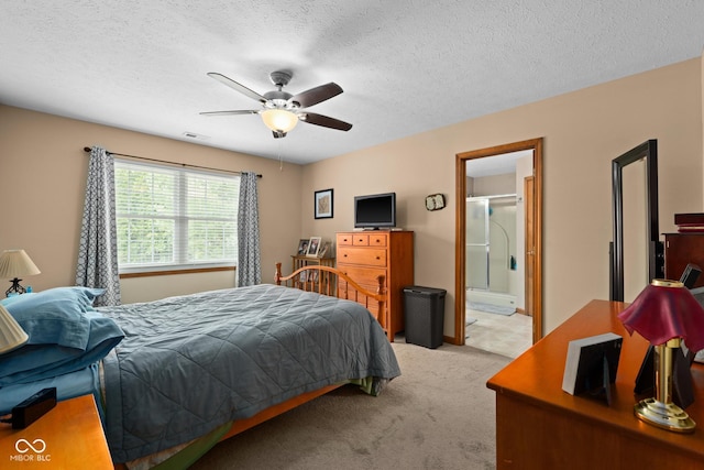 48 Lasalle Ct, Whiteland, IN 46184 - bedroom featuring light carpet, ceiling fan, a textured ceiling, and ensuite bath