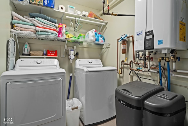 48 Lasalle Ct, Whiteland, IN 46184 - laundry area featuring washer and clothes dryer, water heater, and tile patterned flooring