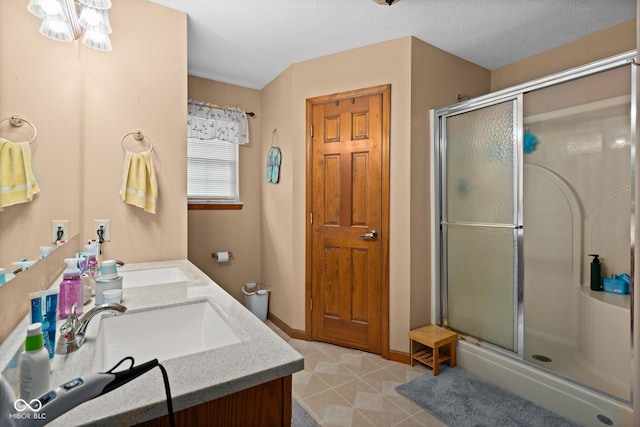 48 Lasalle Ct, Whiteland, IN 46184 - bathroom featuring a shower stall, double vanity, and tile patterned floors