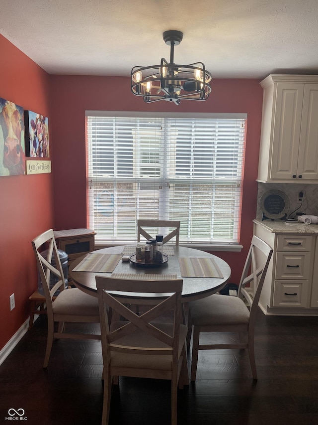 1675 Leisure Way, Greenfield, IN 46140 - dining room featuring a chandelier and dark wood-style floors