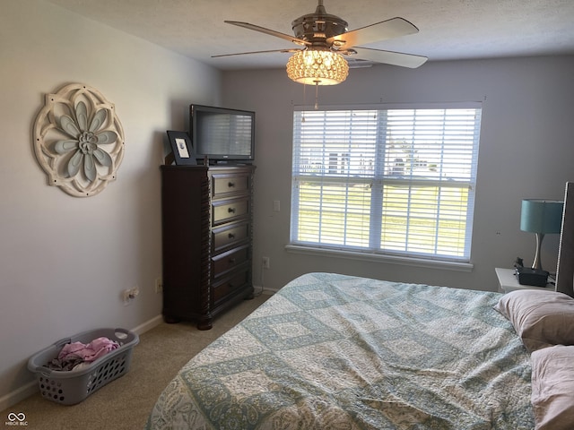 1675 Leisure Way, Greenfield, IN 46140 - bedroom featuring multiple windows, carpet floors, and ceiling fan