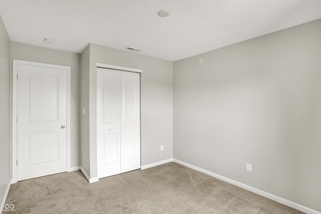 13225 Deception Pass Unit 700, Fishers, IN 46038 - unfurnished bedroom featuring carpet and a closet