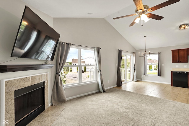 13225 Deception Pass Unit 700, Fishers, IN 46038 - unfurnished living room with a chandelier, light colored carpet, a ceiling fan, light tile patterned floors, and a high end fireplace