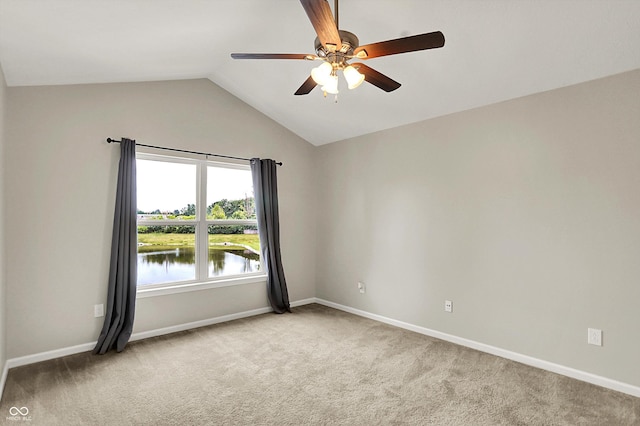 13225 Deception Pass Unit 700, Fishers, IN 46038 - spare room featuring light carpet, vaulted ceiling, ceiling fan, and a water view
