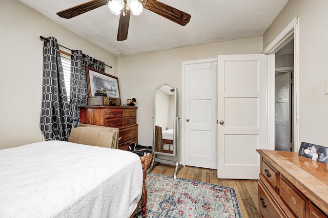 1810 Calhoun St, Indianapolis, IN 46203 - bedroom featuring light wood-type flooring and a ceiling fan