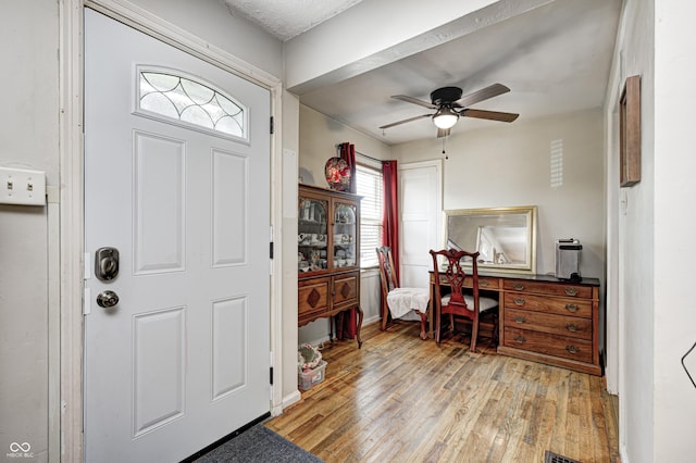 1810 Calhoun St, Indianapolis, IN 46203 - foyer with light wood-style floors and a ceiling fan