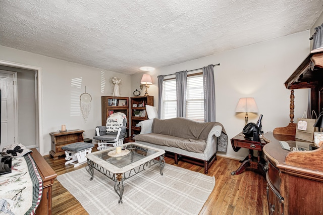 1810 Calhoun St, Indianapolis, IN 46203 - living room featuring a textured ceiling and wood finished floors