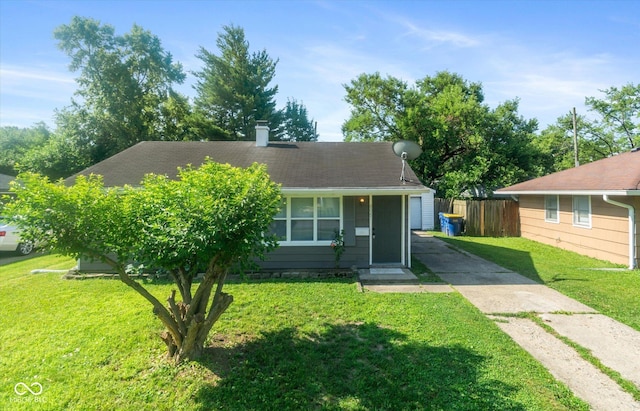 8047 E 48th St, Indianapolis, IN 46226 - view of front facade with roof with shingles and a chimney