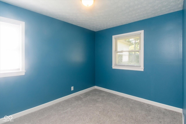 8047 E 48th St, Indianapolis, IN 46226 - empty room with baseboards and carpet flooring