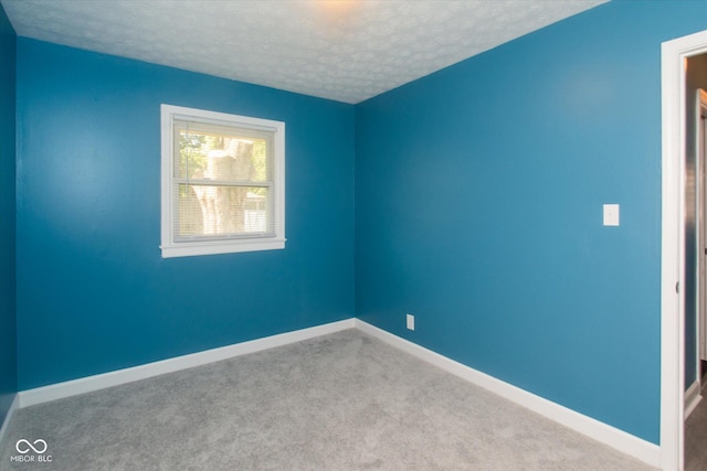 8047 E 48th St, Indianapolis, IN 46226 - unfurnished room with a textured ceiling and carpet